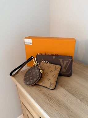 Reverse Monogram Giant Trio Pouch
